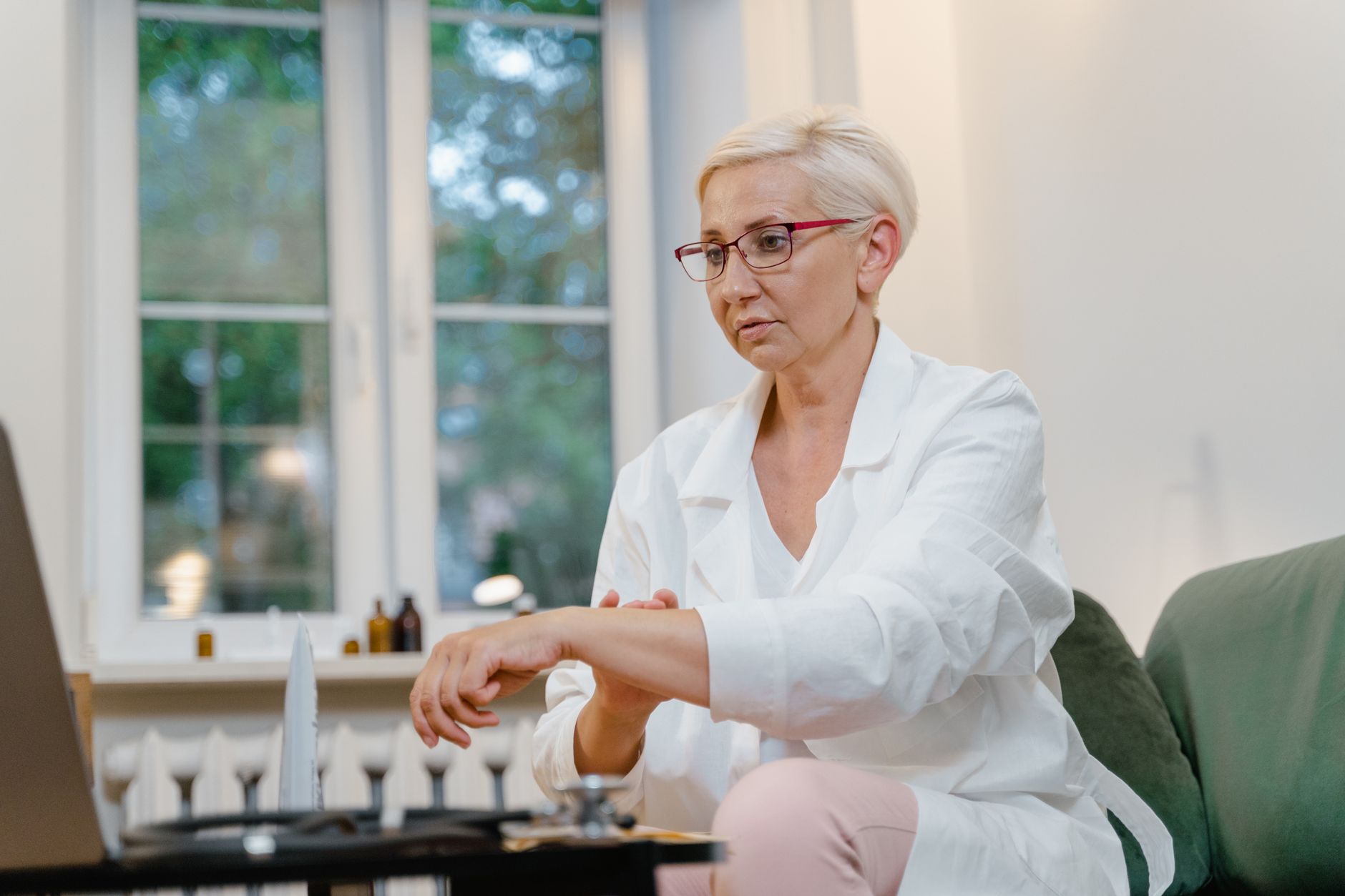 Female nurse practitioner providing a women's hormone health telehealth consultation